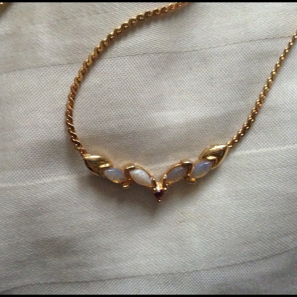 Gold necklace w/ gemstones