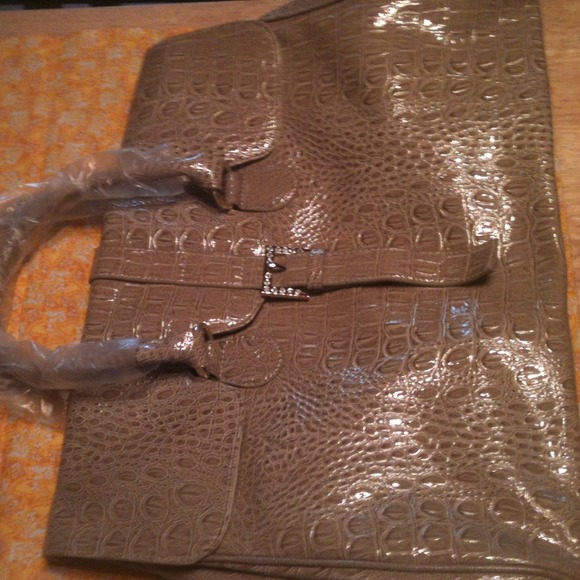 ON HOLD Jessica Simpson tan purse