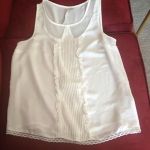 White sleeveless top