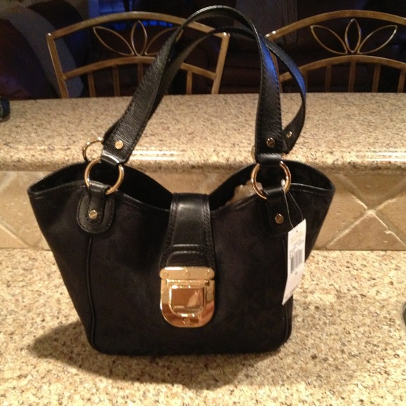 Sold on EBAY.  .  Michael kors Charlton bag