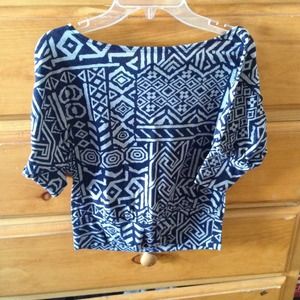Very cute tribal shirt :) it's vintage