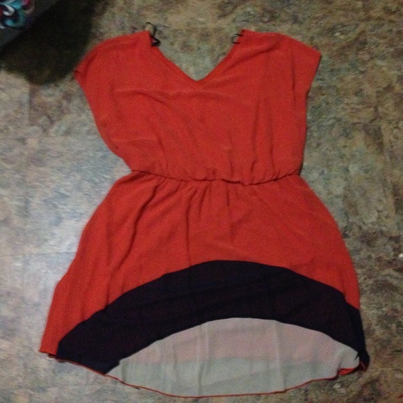 Orange, navy, and tan dress.