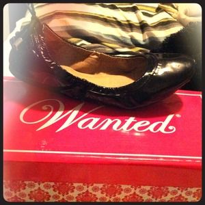 Black flats the brand is wanted