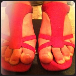 Pink two inch Kelly & Katie heeled sandals.