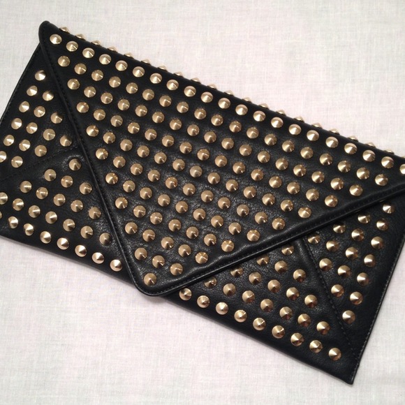 Black leather studded envelope clutch.