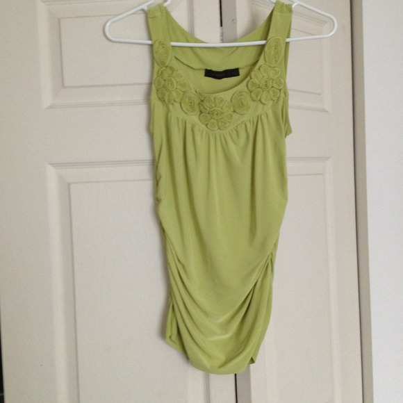 Like green tank with floral embellishments!