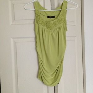 Like green tank with floral embellishments!