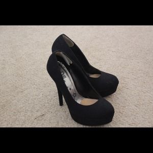 Black stilettos. Worn once