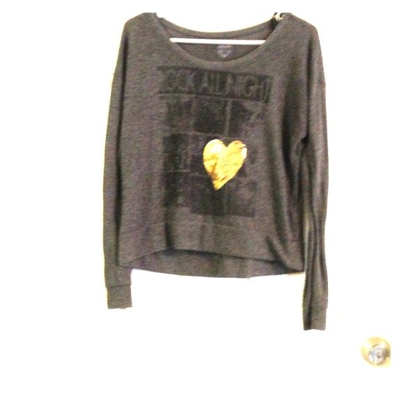 Grey long sleeve shirt.