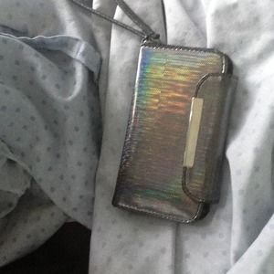 A iPhone 5 case plus wallet.