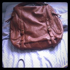 A brown Icings bag.