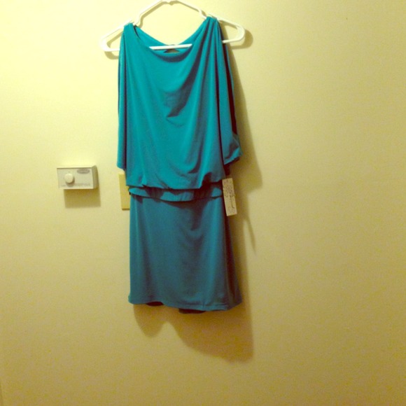 Open shoulder open back dress!