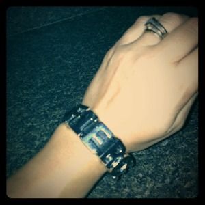 Black leather word cuff
