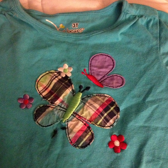 Light blue shirt with plaid butterfly design. - Picture 2 of 4