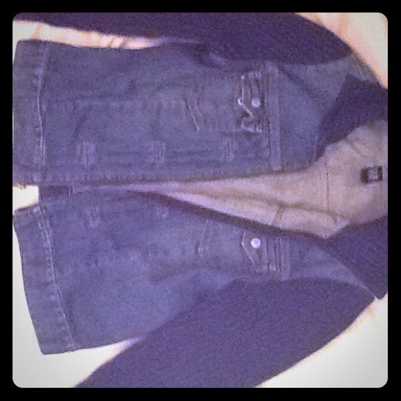 Jean jacket with sweater sleeves