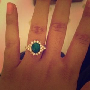Beautiful green and golf ring.