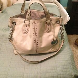 Ivory Michael Kors purse and wallet.