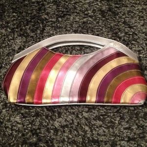 Roxy multi color handbag/clutch