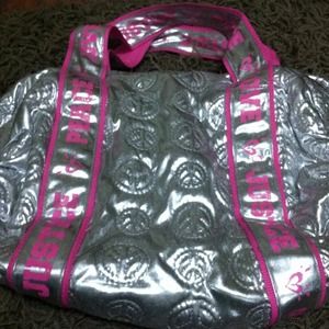 pink and silver justice bag