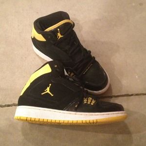 Yellow, white and black Jordan's