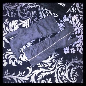 Below the knee black boots