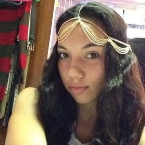 Gold headpiece with diamonds dangling