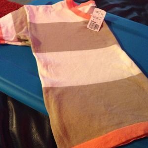 A tan,cream,melon trim wide striped shirt.