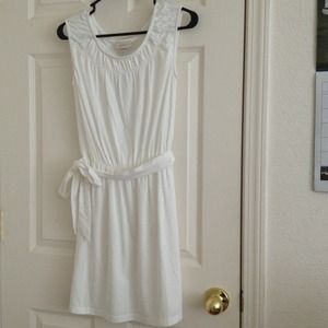Brand new. White dress with belt