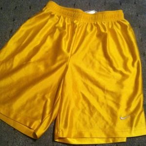 Gold/yellow Nike basketball shorts.!