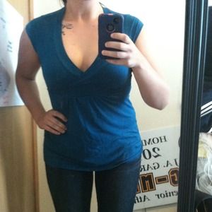 Low cut teal sleeveless