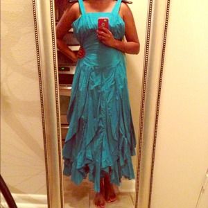 Beautiful turquoise dress with ruffled bottom