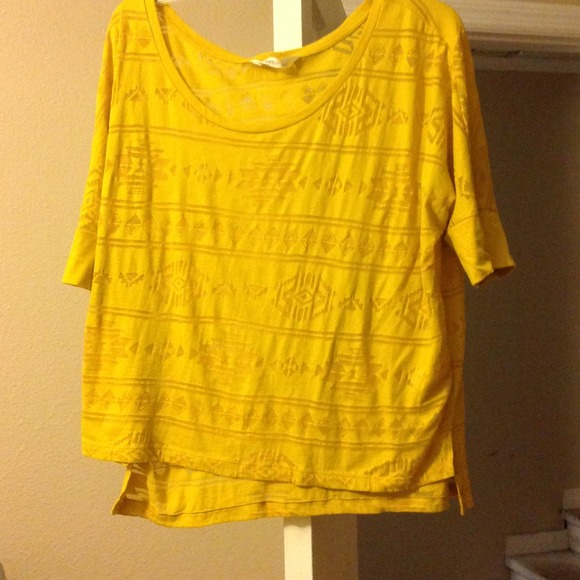 Tribal, see through shirt.