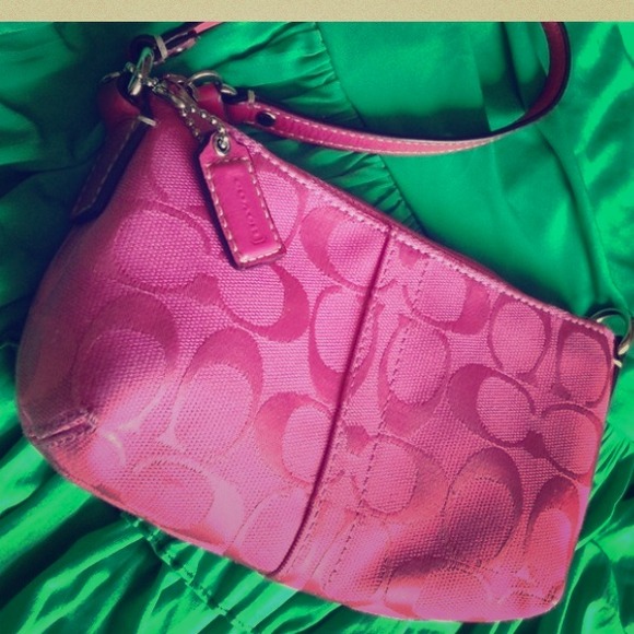 Authentic pink coach wristlet.