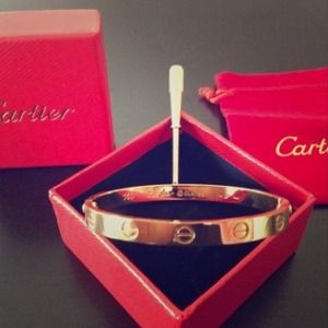 Gold tone screw bangle bracelet