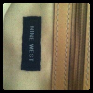 I am selling gently used, Nine West purse.