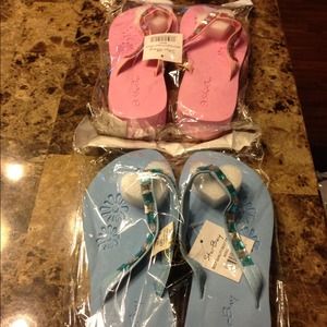 Brand new flip flops 2 pairs have other sizes