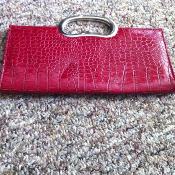 Red clutch. Free with $20 purchase.