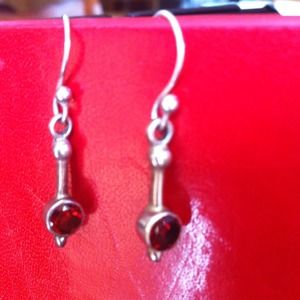Sold in bundle. Silver and garnet earrings