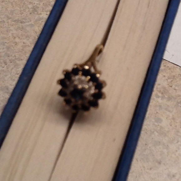 Sapphire and diamond yellow gold ring