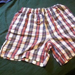 Plaid cotton shorts.  Colors are reds and blues.
