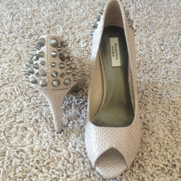 Nude snake skin pumps with spikes