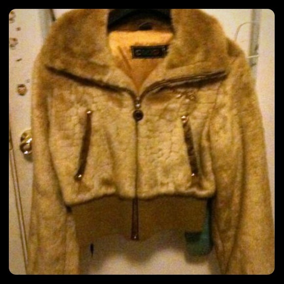 Womens Coogi fur coat