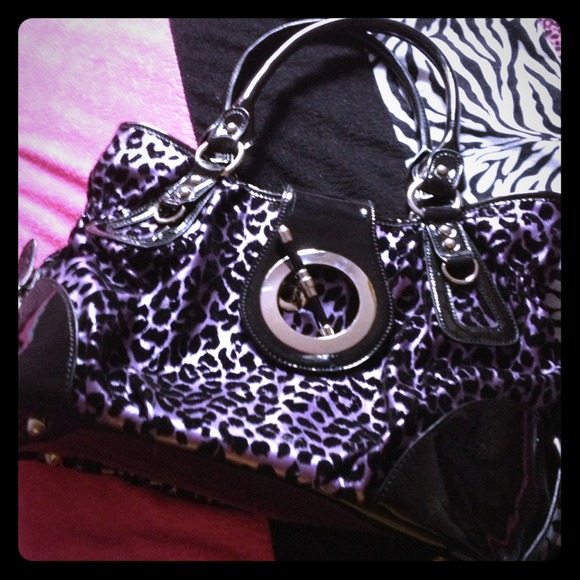 Purple leopard purse with large buckle