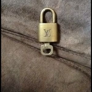 Authentic Louis Vuitton Lock and 1 key.