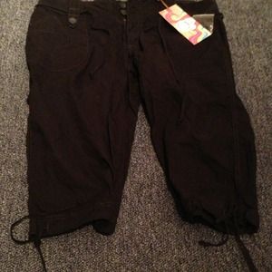 Brand new OP black thigh knee length shorts