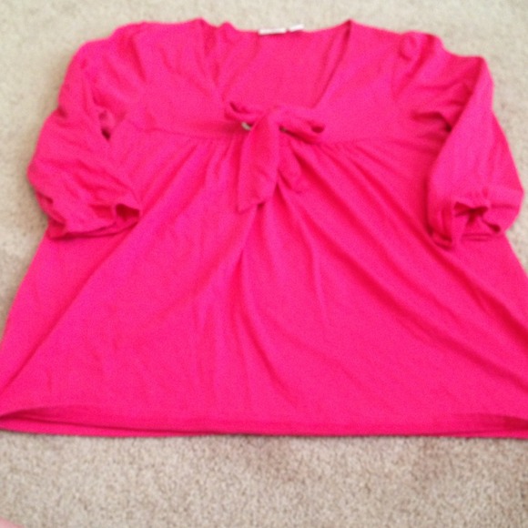 Pink three quarter length top.