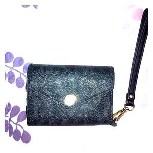 Michael Kors wallet/iPhone 4/4s holder.