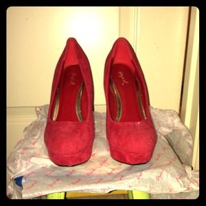 Red heels size 7.5, worn once.