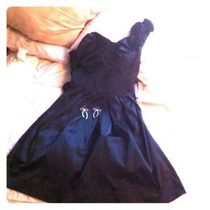 Beautiful one shoulder dress.Black W/flower detail
