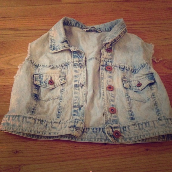 Faded sleeveless denim jacket